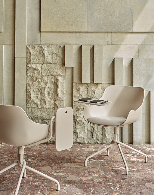 White Baltic conference chairs on a swivel base, one with a writing tablet