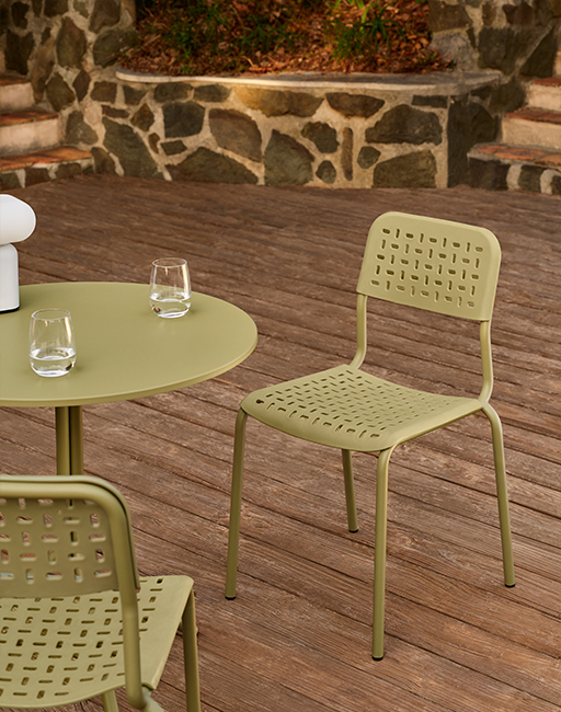 White Baltic conference chairs on a swivel base, one with a writing tablet