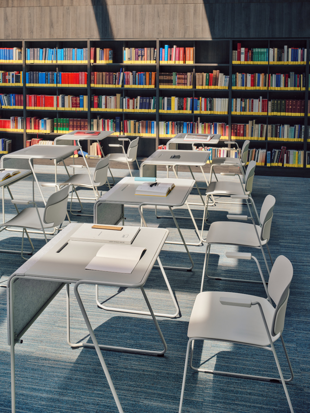 A library interior arranged with grey Loop desks and Lena chairs