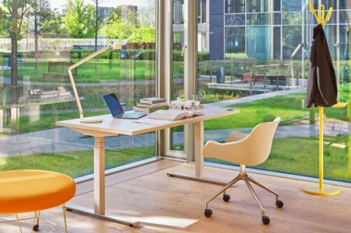 Adjustable workstation with white legs