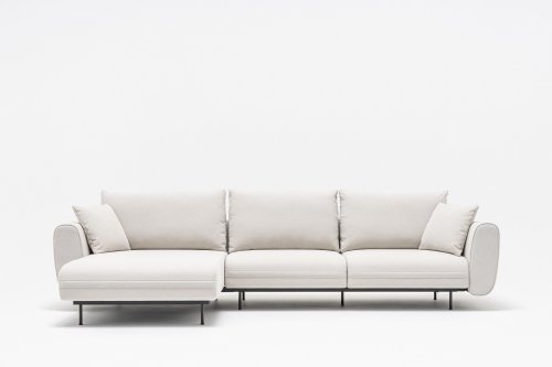 Light grey corner sofa with soft back cushions and slender metal legs