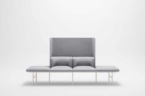 The modern Agora sofa in grey fabric with a distinctive high backrest