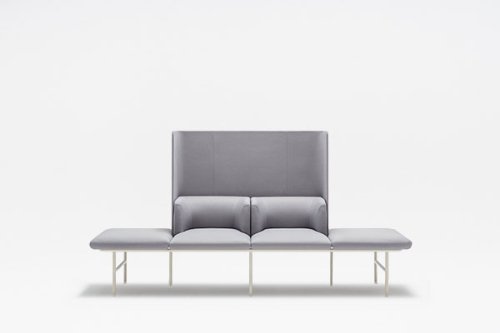 The modern Agora sofa in grey fabric with a distinctive high backrest